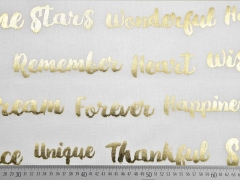 Dekostoff Metallic Words, gold creme