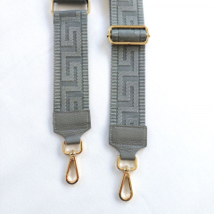 Taschengurt grafisches Muster -grau - dunkelgraues Leder - gold Schnallen