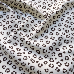 Baumwollstoff Popeline Panther Leopardenmuster, schwarz cremwei