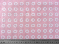 Baumwollstoff Sterne im Kreis 1,8 cm - weiss auf babyrosa
