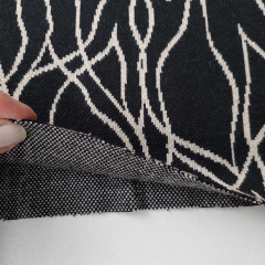 RESTST�CK 150 cm Jacquard Strickstoff abstrakte Linien, beige schwarz