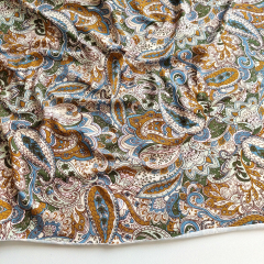 Viskosejersey Paisleymuster rauchblau ockergelb