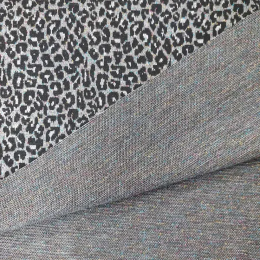 Strickstoff Leomuster Jacquard Glitzer in Regenbogenfarben, grau schwarz