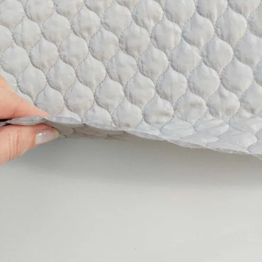 Steppstoff Meterware Doubleface wattiert Tropfen, hellbeige