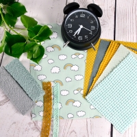 Baumwollstoff Regenb�gen Wolken, ockergelb mint hellgr�n