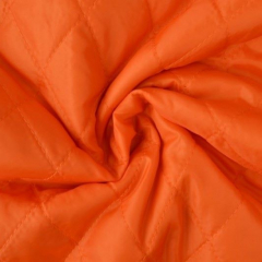 Steppstoff Jackenfutter wattiert Rauten, orange