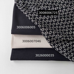 RESTST�CK 50 cm Jacquardstoff Strickstoff Kringel, ecrue schwarz