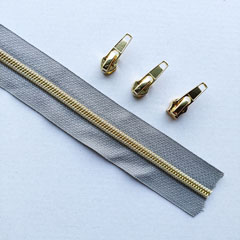 1 m Reißverschluss metallisiert GOLD 6,5mm Spirale + 3 Schieber, mittelgrau