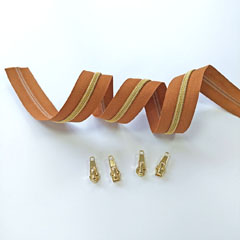 1 m Reiverschluss metallisiert GOLD 6,5 mm Spirale + 3 Schieber, goldbraun