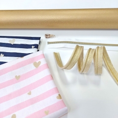 RESTST�CK 50 cm Kunstleder Lederimitat f�r Taschen gepr�gte Optik, gold metallic