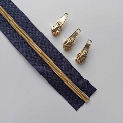 1 m Reiverschluss metallisiert GOLD 6,5 mm Spirale + 3 Schieber, dunkelblau