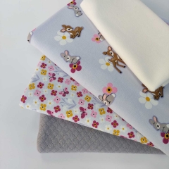Jerseystoff kleine Rehe Hasen Blumen, flieder