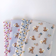 Jerseystoff kleine Rehe Hasen Blumen, flieder