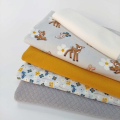 RESTSTCK 33 cm Jerseystoff kleine Blumen Schmetterlinge, ockergelb jeansblau hellgrau