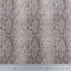 Lederimitat Krokoprgung Schlangendruck, schwarz beige