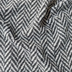 Strickstoff Fischgrt Zickzackmuster dick weich, schwarz grauwei