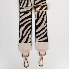 Taschengurt Taschenriemen Zebra Muster, schwarz cremeweiß mit cremeweißen Lederenden, goldfarbige Schnalle