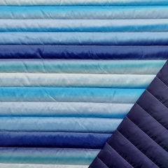 Steppstoff Streifen Farbverlauf wattiert matt glänzend, weiß türkis dunkelblau
