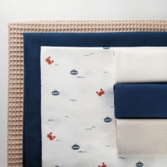 Jerseystoff Krebse Wellen, jeansblau rotbraun cremewei