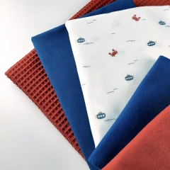 Jerseystoff Krebse Wellen, jeansblau rotbraun cremewei