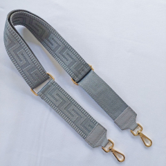Taschengurt grafisches Muster -grau - dunkelgraues Leder - gold Schnallen