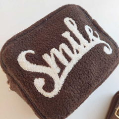 Tasche Retrolook SMILE Teddyboucle - wei dunkelbraun - gold Schnallen