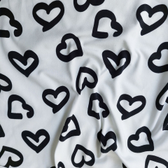 Jerseystoff Herzen, schwarz wei