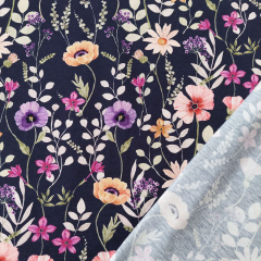 Jerseystoff Blumen, lila beere coralle dunkelblau