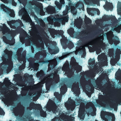 Sweatstoff French Terry Leopardenmuster, dusty blue schwarz