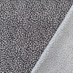 Cordstoff schmale Rippen kleine Leopardenmuster, schwarz ecrue