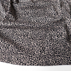 Jacquard Strickstoff kleines Leopardenmuster, beige schwarz