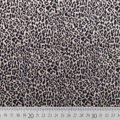 Jacquard Strickstoff kleines Leopardenmuster, beige schwarz