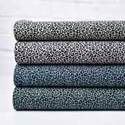 Baumwollstoff kleines Leoparden Muster, schwarz mintgrn