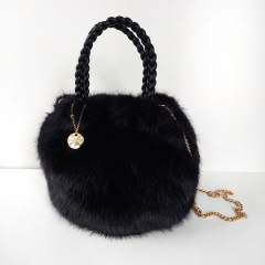 Fake Fur Felltasche rund gold Kette geflochtene Griffe, schwarz