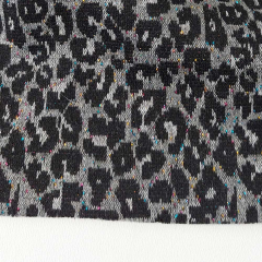 Strickstoff Leomuster Jacquard Glitzer in Regenbogenfarben, grau schwarz