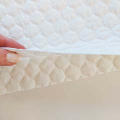 Steppstoff Meterware Tropfen wattiert wasserabweisend, cremwei�